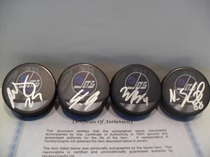 Winnipeg Jets 4 Signed Pucks Paul Stastny Logan Stanley Pionk Nate Schmidt COA - Picture 1 of 2