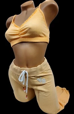 PANTALONES DE CHÁNDAL RECORTADOS LIGEROS Y2K NARANJAS SECRETAS VICTORiA'S + sujetadoriE FiT S Foto 1 de 4