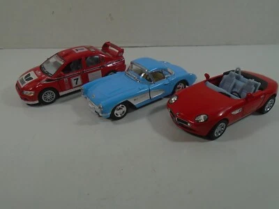 3 KINSMART--MITSUBISHI LANCER, 1957 CORVETTE, AND BMW Z8 CARS (LOOK) PULL BACK - Image 1 of 4