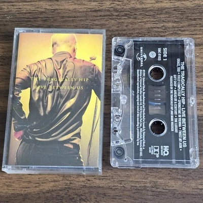 The Tragically Hip Live Between Us - RARE HTF Cassette Tape - 1997 - UMC-81055 - Image 1 of 4