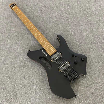 Guitarra eléctrica negra mate, sin cabeza, diapasón de arce, accesorios negros Foto 1 de 4