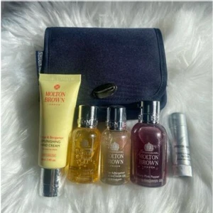 Molton Brown London Luxury Travel Bundle; Shower Gel Hand Cream Lip Balm & Case - Picture 1 of 6