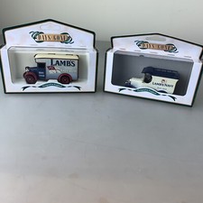 Two Lledo Vans,DG097006 Sentinel S4,  DG016046 Dennis Parcels Van Lambs Navy Rum