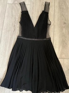 NWOT Bebe Black Pleated Cocktail Dress Satin Waist Sheer Side Zip Closure Size 0 - Picture 1 of 9