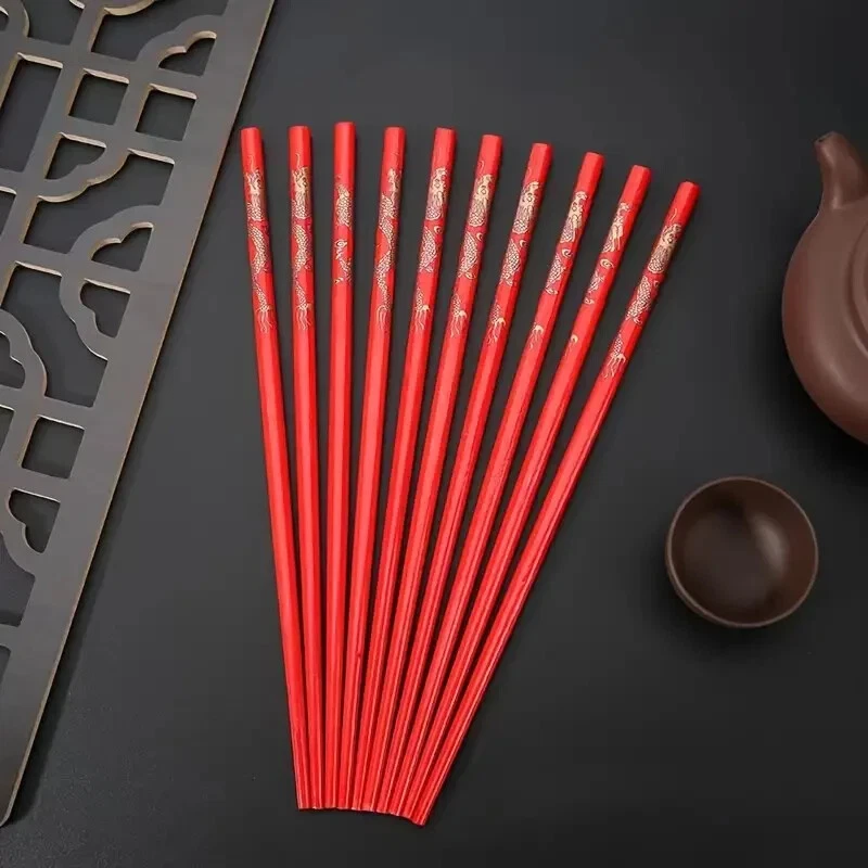 5 pares de palillos dragón con resto Foto 1 de 4