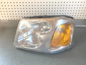 GM OEM NOS 15069669 LH Driver Side Head Lamp 2002-2009 GMC Envoy - Picture 1 of 4
