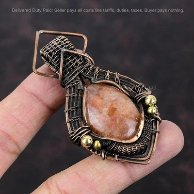 Oferta de Año Nuevo Cobre Ovalado Piedras Preciosas Hija Étnico Alambre Envuelto Colgante Foto 1 de 4