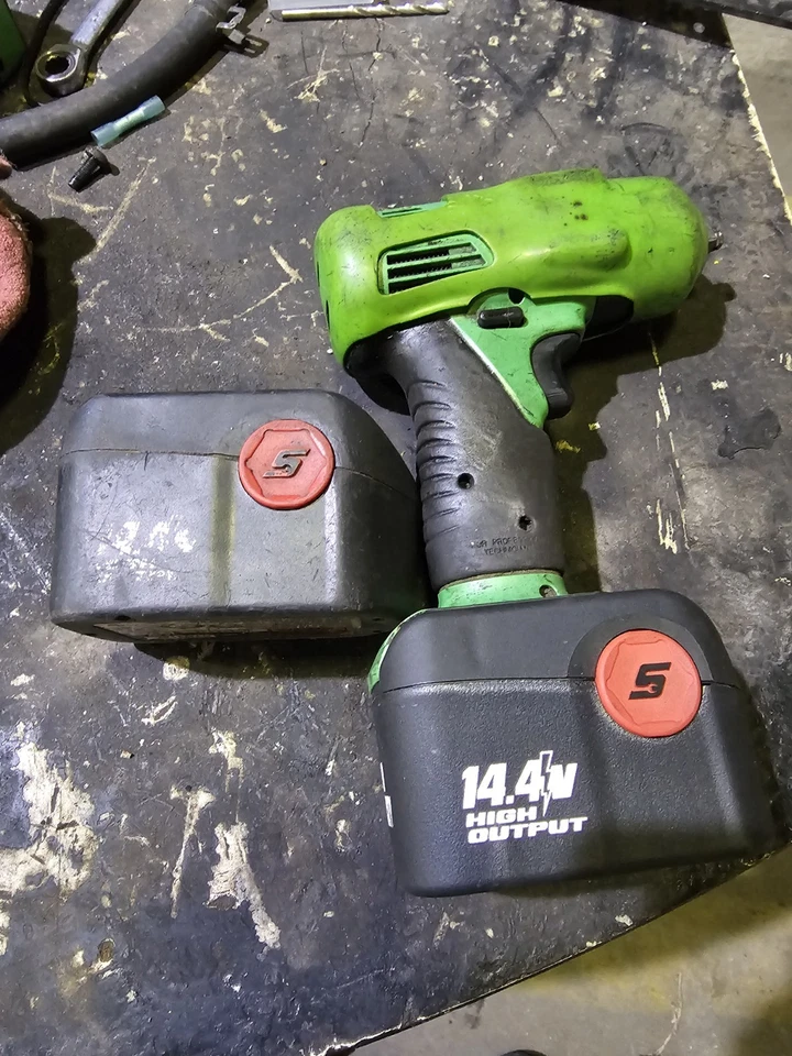 Green Snap On 14.4 3/8 Drive Cordless Impact includes  charger ser description  - Image 1 of 3