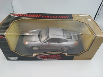 Литая под давлением серебристая модель Porsche 911 Premier Collection масштаба 1:18 Motormax никогда не снималась - Изображение 1 из 4