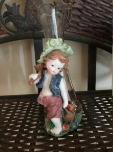 Vintage Boy Figurine with Fishing net & Fish in bucket with vase behind him - Picture 1 of 5