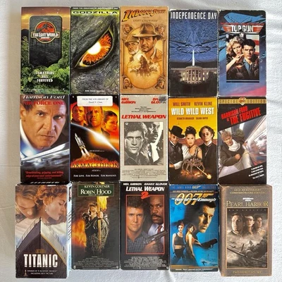 Lot of 15 Action Movies VHS Tapes Top Gun Lost World Godzilla Indiana Jones VG Foto 1 de 4