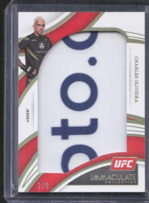 2022 Immaculate UFC #JM-COV Charles Oliveira Fighter-Worn Jersey Relic /8 - Image 1 of 2