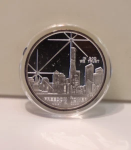 2004 $1 WORLD TRADE CENTER TWIN FREEDOM TOWERS PROOF COIN SILVER 100 MIL CLAD - Picture 1 of 3