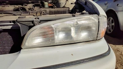 Luz de cabeza izquierda para conductor Pontiac Bonneville 1992-1995 OEM 16519272 Foto 1 de 4