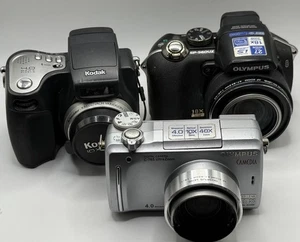 Kodak EasyShare DX6490 Olympus C-765, SP560UZ Digitalkamera Set 3 Stück - Bild 1 von 3