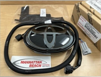 24-25 TACOMA ILLUMINATED DARK CHROME FRONT GRILL EMBLEM PT413-35241 GENUINE - Image 1 of 4