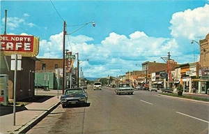 Tarjeta postal de autos de ocupación de la sección comercial Del Norte Colorado de la década de 1960 25-10882 - Imagen 1 de 2