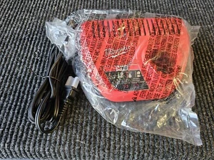 NEW Milwaukee M12 Lithium-ion Battery Charger 48-59-2401 From Tool Kit Not Used - Picture 1 of 5