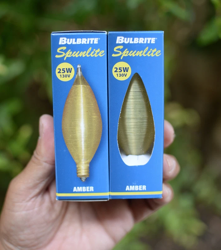 Bulbrite Spunlite 25W 130V Lightbulb  Color: Amber item no: 430125 Candelabra - Image 1 of 4