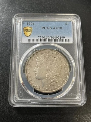 1904 P MORGAN DOLLAR PCGS AU-50 - ABOUT UNCIRCULATED - BETTER DATE - SLAB - $1 - Image 1 of 2