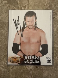 Adam Cole Laminated Signed Photograph Bullet Club - Picture 1 of 11