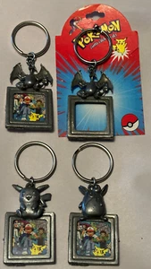 Lote De Colección x4 Pokémon Charizard Pikachu Marco Metal Clefable Llaveros Nintendo - Imagen 1 de 10