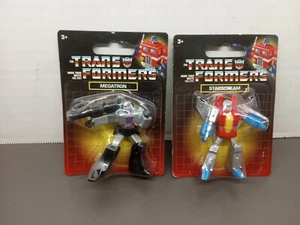 Mini figura de juguete Transformers Starscream y Megatron Hasbro nueva - Imagen 1 de 6