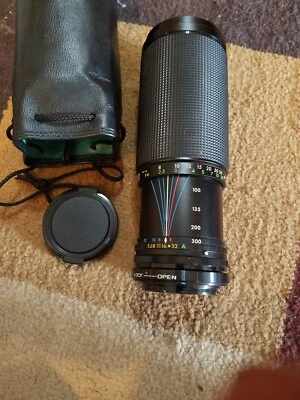 Sakar MC Auto Zoom/Macro 75-300mm f5.6 Lens with cap and case - Image 1 of 4