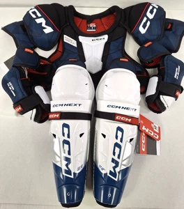 Juego de equipo de hockey CCM Next Junior - Espinilleras grandes junior de 12" - Imagen 1 de 3