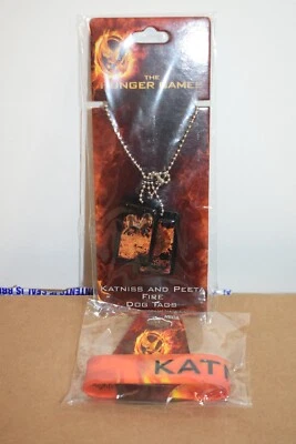 NECA THE HUNGER GAMES Katniss & Peeta Fire Dog Tags & Katniss Rubber Bracelet - Изображение 1 из 4