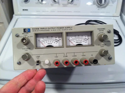 HP  6237B TRIPLE OUTPUT DC POWER SUPPLY with Manual - Image 1 of 2