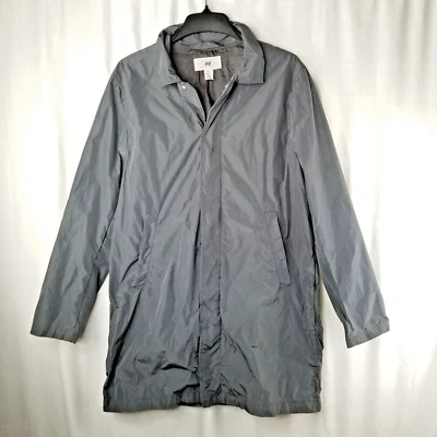 Chaqueta impermeable de trinchera para mujer H&M con bolsillos suaves gris concha Foto 1 de 4