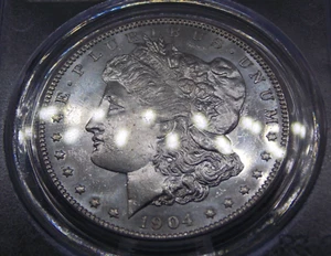 1904 "O" Morgan SILBER Dollar 1 $ PCGS MS63 PL #137 *PROOF LIKE* ECC&C, Inc. - Bild 1 von 9