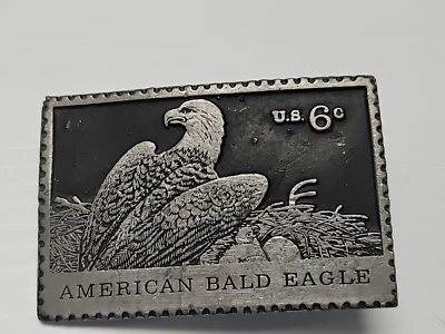 Hebilla de cinturón estampilla de 6 centavos American Bald Eagle de peltre macizo vintage franqueo de Estados Unidos Foto 1 de 2