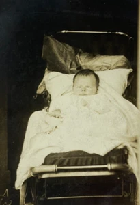 Baby Sitting In Stroller With Glowing Eyes Photo RPPC - Picture 1 of 3