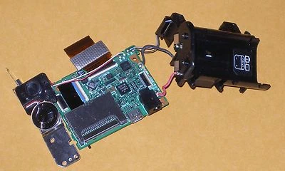 Parts: Olympus SP 350 8 mega pixel digital camera, main board  assembly - Image 1 of 2