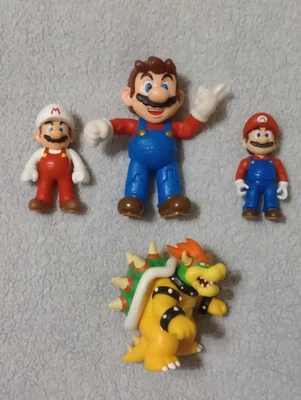 Jakks World of Nintendo Super Mario Figures Mario, Bowser, Fire Mario & Odyssey  - Image 1 of 4