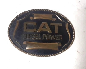VTG CAT Diesel Power Belt Buckle Caterpillar Mequon WI  1982 Sales Guide - Picture 1 of 3