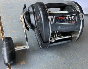 Penn Angelrolle 345 GTI Graphite Big Game Level Wind funktioniert super - Bild 1 von 8