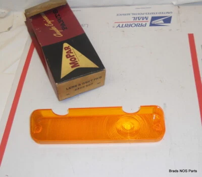 NOS MoPar 1964 Plymouth Belvedere Fury  LH AMBER PARK LITE LENS  pn 2495507 - Image 1 of 2