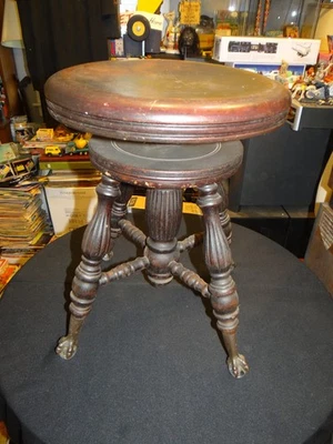 Antiguo taburete de piano giratorio de madera Chas Parker Co hierro fundido vidrio bola patas  Foto 1 de 4