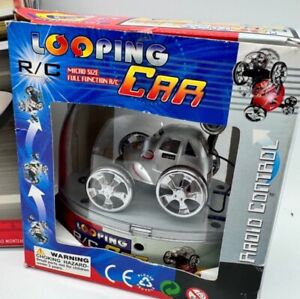RADIO CONTROL LOOPING CAR & PICOOZ REMOTE CONTROL HELICOPTER BOTH BIXED AND NEW