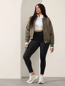 NUEVO CON ETIQUETAS Athleta Delancey Skyline Apretado 1X Negro Bolsillos Absorbentes Puño con Cremallera Elástico - Imagen 1 de 12