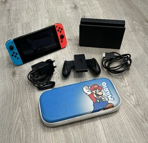 Nintendo Switch 32 GB Console & Accessories- Neon Red/Blue - Picture 1 of 4