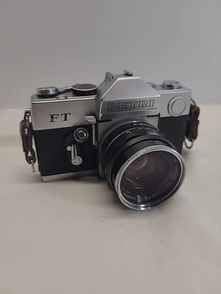 Cámara fotográfica Petri FT 419976 vintage de 35 mm hecha en Japón sin probar como está Foto 1 de 4