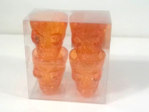 NIB Set of 4 Orange Skull Halloween Shot Glasses Plastic 1.5 oz Transparent - Picture 1 of 3