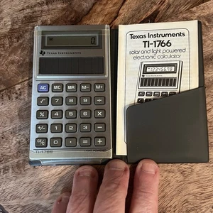 Vintage Texas Instruments TI-1766 Solar Pocket Calculator w Case & Manual - Picture 1 of 5