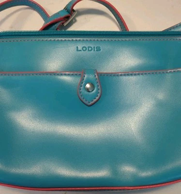 Bolso Pequeño Bandolera Lodis Audrey Vicky Cuero Turquesa Borde Rosa Caliente Foto 1 de 4