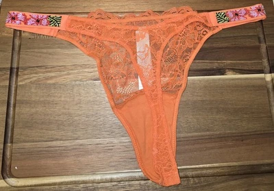 Nuevo con etiquetas Victoria's Secret Muy Sexy Logo Brillo Correa Encaje Tanga Panty Naranja 2X Foto 1 de 4