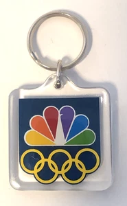 Schlüsselanhänger NBC TV Olympiade Sommer Winter Pfau Werbung Swag Vintage neu neu aus altem Lagerbestand Kunststoffkette - Bild 1 von 2